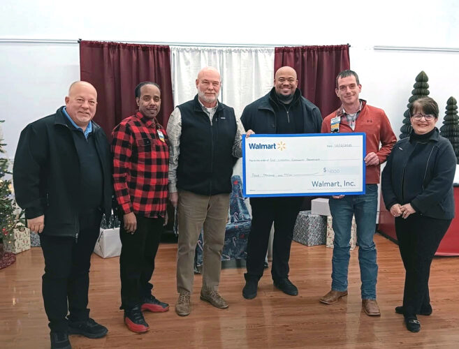 Mayor accepts donation for bike trail from Walmart